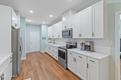 Are you searching for a home that is truly move-in ready? This on Lockwood Folly Country Club in North Carolina - for sale on GolfHomes.com, golf home, golf lot