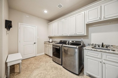 Rare opportunity to own a spacious one-story home on a half-acre on The Golf Club at Resort Eagle Mountain Lake in Texas - for sale on GolfHomes.com, golf home, golf lot