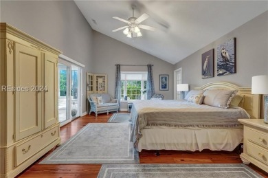 Nestled in Palmetto Dunes, this stunning 5-bedroom, 4.5-bath on Palmetto Dunes Golf Course and Resort in South Carolina - for sale on GolfHomes.com, golf home, golf lot