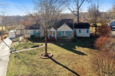 Stone Ranch cottage in coveted Golden Acres is pure magic on Drumm Farm Golf Course in Missouri - for sale on GolfHomes.com, golf home, golf lot