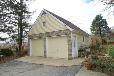 Stone Ranch cottage in coveted Golden Acres is pure magic on Drumm Farm Golf Course in Missouri - for sale on GolfHomes.com, golf home, golf lot