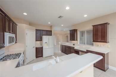 One or more photo(s) has been virtually staged. SUMMERGLEN GOLF on Summerglen Country Club in Florida - for sale on GolfHomes.com, golf home, golf lot