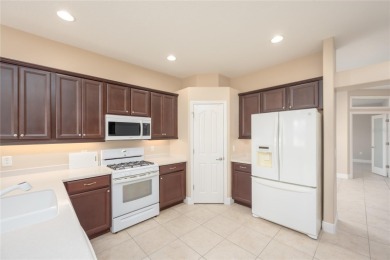 One or more photo(s) has been virtually staged. SUMMERGLEN GOLF on Summerglen Country Club in Florida - for sale on GolfHomes.com, golf home, golf lot