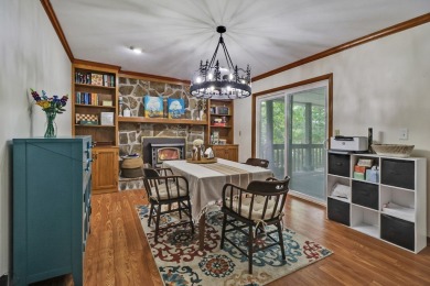 Enjoy lake views of St. George from this beautifully updated 1 on Druid Hills Golf Club in Tennessee - for sale on GolfHomes.com, golf home, golf lot