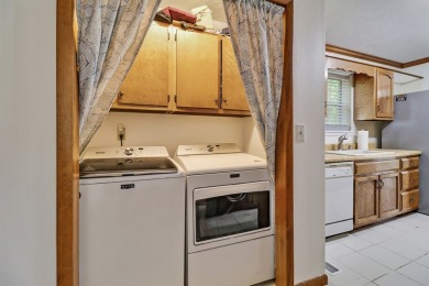 Enjoy lake views of St. George from this beautifully updated 1 on Druid Hills Golf Club in Tennessee - for sale on GolfHomes.com, golf home, golf lot