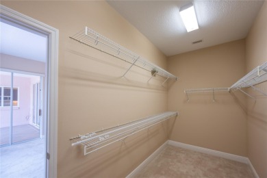 One or more photo(s) has been virtually staged. SUMMERGLEN GOLF on Summerglen Country Club in Florida - for sale on GolfHomes.com, golf home, golf lot