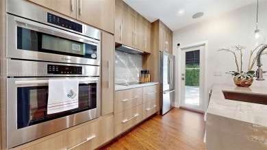 Stunning four-bedroom, three-bath home plus additional flex area on Granada Golf Club in Florida - for sale on GolfHomes.com, golf home, golf lot