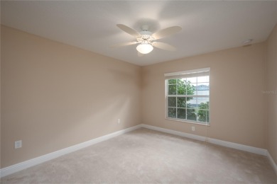 One or more photo(s) has been virtually staged. SUMMERGLEN GOLF on Summerglen Country Club in Florida - for sale on GolfHomes.com, golf home, golf lot