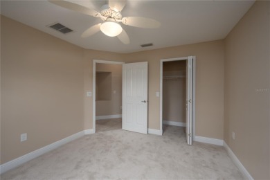 One or more photo(s) has been virtually staged. SUMMERGLEN GOLF on Summerglen Country Club in Florida - for sale on GolfHomes.com, golf home, golf lot