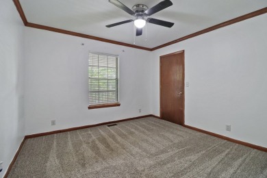Enjoy lake views of St. George from this beautifully updated 1 on Druid Hills Golf Club in Tennessee - for sale on GolfHomes.com, golf home, golf lot