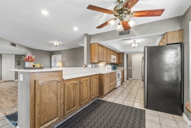 THIS 4 BEDROOM Expanded Augusta ON THE GOLF COURSE is sure to on Stardust Golf Course in Arizona - for sale on GolfHomes.com, golf home, golf lot