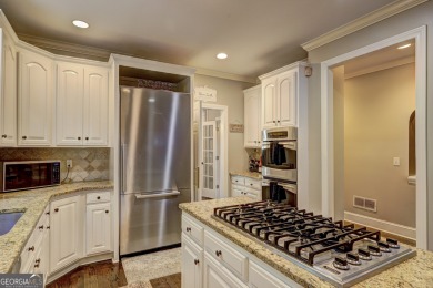 Introducing this Exquisite home in prestigious Huntcliff on Cherokee Town and Country Club in Georgia - for sale on GolfHomes.com, golf home, golf lot