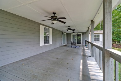 Enjoy lake views of St. George from this beautifully updated 1 on Druid Hills Golf Club in Tennessee - for sale on GolfHomes.com, golf home, golf lot