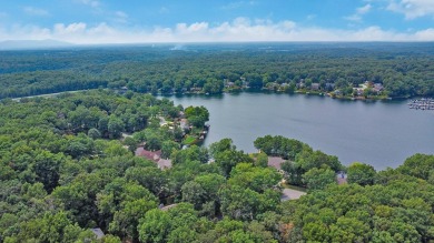 Enjoy lake views of St. George from this beautifully updated 1 on Druid Hills Golf Club in Tennessee - for sale on GolfHomes.com, golf home, golf lot
