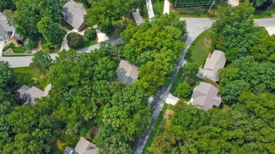 Enjoy lake views of St. George from this beautifully updated 1 on Druid Hills Golf Club in Tennessee - for sale on GolfHomes.com, golf home, golf lot