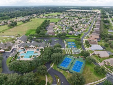 One or more photo(s) has been virtually staged. SUMMERGLEN GOLF on Summerglen Country Club in Florida - for sale on GolfHomes.com, golf home, golf lot