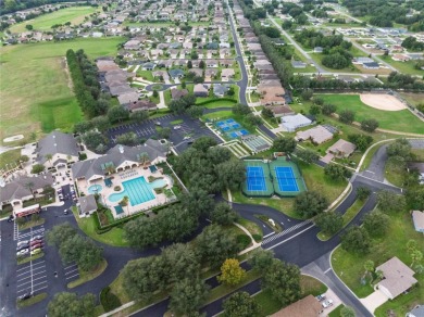 One or more photo(s) has been virtually staged. SUMMERGLEN GOLF on Summerglen Country Club in Florida - for sale on GolfHomes.com, golf home, golf lot