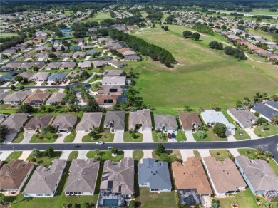 One or more photo(s) has been virtually staged. SUMMERGLEN GOLF on Summerglen Country Club in Florida - for sale on GolfHomes.com, golf home, golf lot