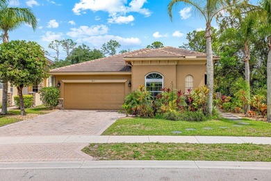 Elegant 4BR/3BA estate home in Osprey Isles, surrounded by on Palm Beach Gardens Golf Course in Florida - for sale on GolfHomes.com, golf home, golf lot