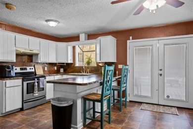 Embrace the tranquility of country living in this beautifully on Lake Whitney Country Club in Texas - for sale on GolfHomes.com, golf home, golf lot