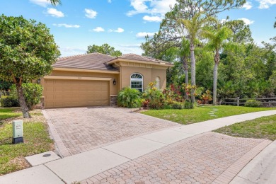 Elegant 4BR/3BA estate home in Osprey Isles, surrounded by on Palm Beach Gardens Golf Course in Florida - for sale on GolfHomes.com, golf home, golf lot