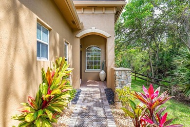 Elegant 4BR/3BA estate home in Osprey Isles, surrounded by on Palm Beach Gardens Golf Course in Florida - for sale on GolfHomes.com, golf home, golf lot