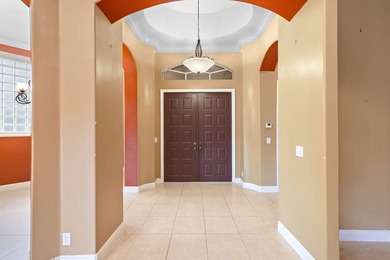 Elegant 4BR/3BA estate home in Osprey Isles, surrounded by on Palm Beach Gardens Golf Course in Florida - for sale on GolfHomes.com, golf home, golf lot