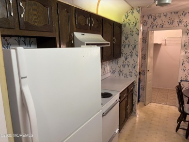 Bring your vision to this spacious 2 BR, 2 Bath condo in the on Pine Brook Golf Course in New Jersey - for sale on GolfHomes.com, golf home, golf lot
