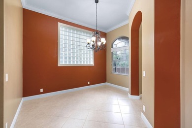 Elegant 4BR/3BA estate home in Osprey Isles, surrounded by on Palm Beach Gardens Golf Course in Florida - for sale on GolfHomes.com, golf home, golf lot