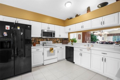 FANTASTIC MOVE IN READY HOME with OUTSTANDING VIEW OF THE GOLF on Heritage Pines Country Club in Florida - for sale on GolfHomes.com, golf home, golf lot