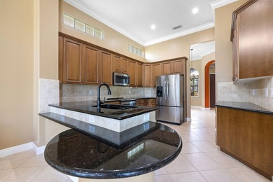 Elegant 4BR/3BA estate home in Osprey Isles, surrounded by on Palm Beach Gardens Golf Course in Florida - for sale on GolfHomes.com, golf home, golf lot