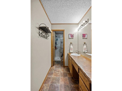 Embrace the tranquility of country living in this beautifully on Lake Whitney Country Club in Texas - for sale on GolfHomes.com, golf home, golf lot