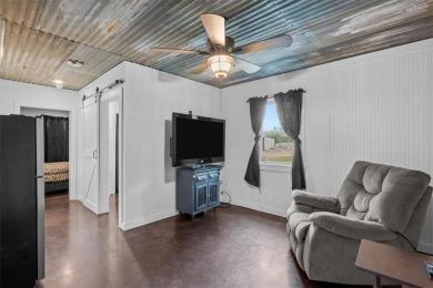 Embrace the tranquility of country living in this beautifully on Lake Whitney Country Club in Texas - for sale on GolfHomes.com, golf home, golf lot