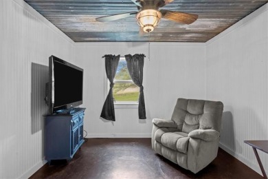 Embrace the tranquility of country living in this beautifully on Lake Whitney Country Club in Texas - for sale on GolfHomes.com, golf home, golf lot