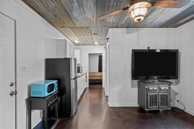 Embrace the tranquility of country living in this beautifully on Lake Whitney Country Club in Texas - for sale on GolfHomes.com, golf home, golf lot