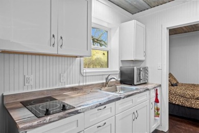 Embrace the tranquility of country living in this beautifully on Lake Whitney Country Club in Texas - for sale on GolfHomes.com, golf home, golf lot