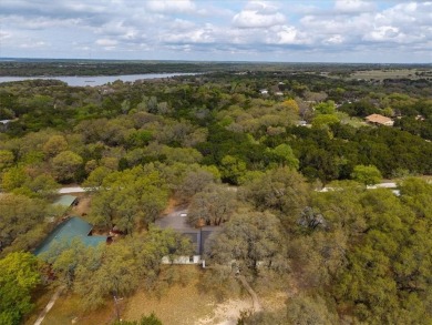 Embrace the tranquility of country living in this beautifully on Lake Whitney Country Club in Texas - for sale on GolfHomes.com, golf home, golf lot
