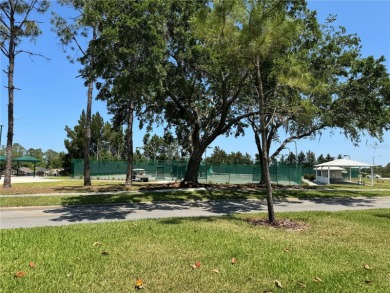 FANTASTIC MOVE IN READY HOME with OUTSTANDING VIEW OF THE GOLF on Heritage Pines Country Club in Florida - for sale on GolfHomes.com, golf home, golf lot