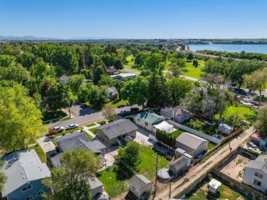 Don't miss this great investment opportunity! Duplex with lots on American Falls Golf Course in Idaho - for sale on GolfHomes.com, golf home, golf lot