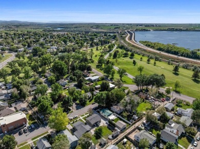 Don't miss this great investment opportunity! Duplex with lots on American Falls Golf Course in Idaho - for sale on GolfHomes.com, golf home, golf lot