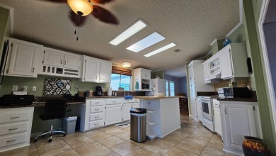 Join us for a tour of this meticulously maintained 2 bedrooms, 2 on The Riverside Golf Club in Florida - for sale on GolfHomes.com, golf home, golf lot