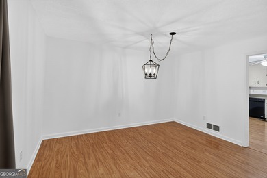 Lakefront Luxury Living with Stunning Views! This beautifully on Fairfield Plantation Golf and Country Club in Georgia - for sale on GolfHomes.com, golf home, golf lot