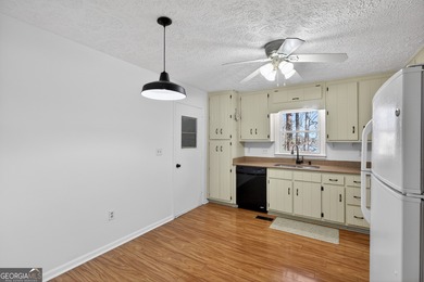 Lakefront Luxury Living with Stunning Views! This beautifully on Fairfield Plantation Golf and Country Club in Georgia - for sale on GolfHomes.com, golf home, golf lot