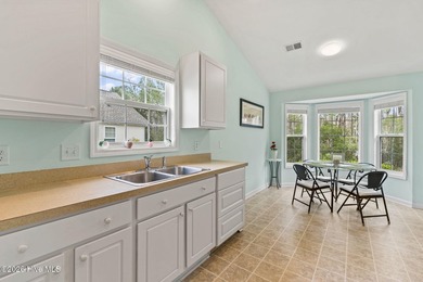 Beautifully maintained and freshly painted, this 4 bedroom, 3 on Crow Creek Golf Club in North Carolina - for sale on GolfHomes.com, golf home, golf lot