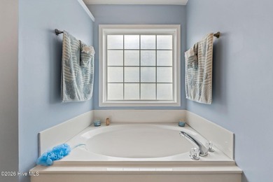 Beautifully maintained and freshly painted, this 4 bedroom, 3 on Crow Creek Golf Club in North Carolina - for sale on GolfHomes.com, golf home, golf lot