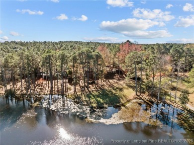 Beautifully renovated golf front home with expansive views of on Seven Lakes Country Club in North Carolina - for sale on GolfHomes.com, golf home, golf lot