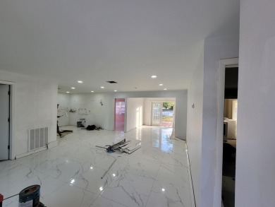 Step into luxury! This fully remodeled 4-bed, 2-bath stunner on Forest Oaks Golf Club in Florida - for sale on GolfHomes.com, golf home, golf lot