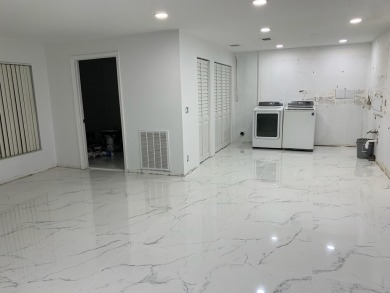 Step into luxury! This fully remodeled 4-bed, 2-bath stunner on Forest Oaks Golf Club in Florida - for sale on GolfHomes.com, golf home, golf lot