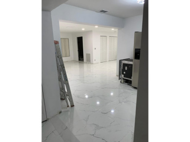 Step into luxury! This fully remodeled 4-bed, 2-bath stunner on Forest Oaks Golf Club in Florida - for sale on GolfHomes.com, golf home, golf lot