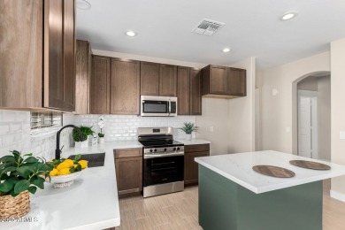 This fabulous home in a gated golf course community is full of on The Legacy Golf Resort in Arizona - for sale on GolfHomes.com, golf home, golf lot